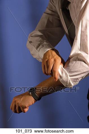 Rolling up sleeves View Large Photo Image Stock Image - Rolling up sleeves. Fotosearch