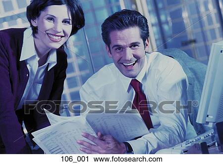 Business couple reading View Large Photo Image Stock Image - Business couple reading. Fotosearch