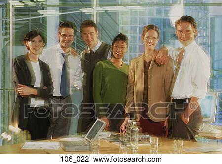 Stock Image - Business people in office. Fotosearch