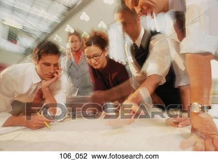 Stock Image - Business people in office. Fotosearch