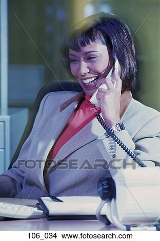 Business woman on phone View Large Photo Image Picture - Business woman on phone. Fotosearch