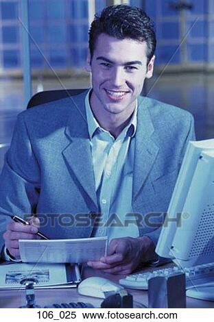 Stock Photography - Businessman at his desk. Fotosearch