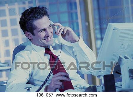 Stock Photo - Businessman on phone. Fotosearch