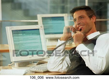 Stock Photograph - Businessman on phone. Fotosearch