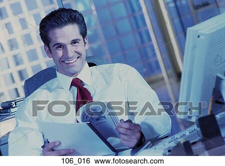Stock Photograph - Businessman smiling. Fotosearch