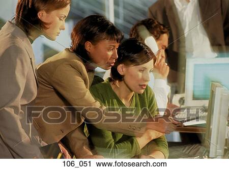 Stock Image - Office scene. Fotosearch