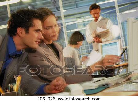 Stock Photograph - Office scene. Fotosearch