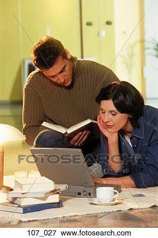 Couple at computer View Large Photo Image Stock Photo - Couple at computer. Fotosearch
