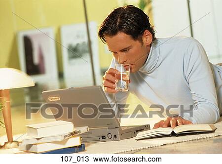 Man at computer View Large Photo Image Stock Image - Man at computer. Fotosearch