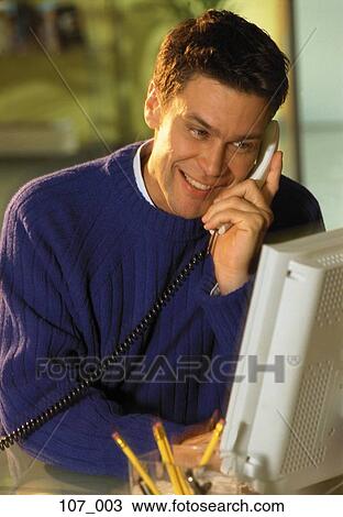 Stock Image - Man in office. Fotosearch