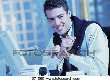 Man in office View Large Photo Image Stock Image - Man in office. Fotosearch