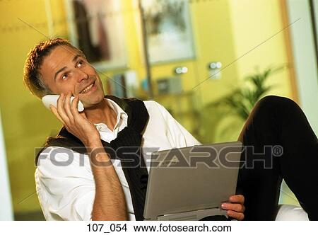Man on phone View Large Photo Image Picture - Man on phone. Fotosearch