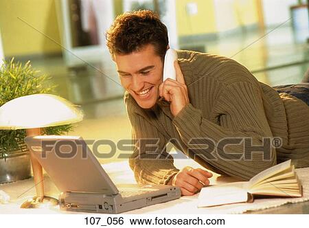 Man on phone View Large Photo Image Stock Photograph - Man on phone. Fotosearch