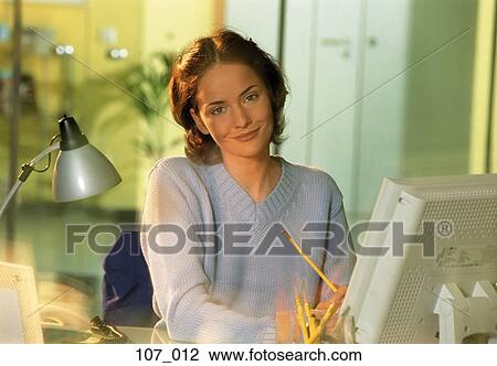 Woman at computer View Large Photo Image Stock Image - Woman at computer. Fotosearch