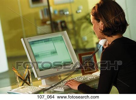 Woman in office View Large Photo Image Picture - Woman in office. Fotosearch
