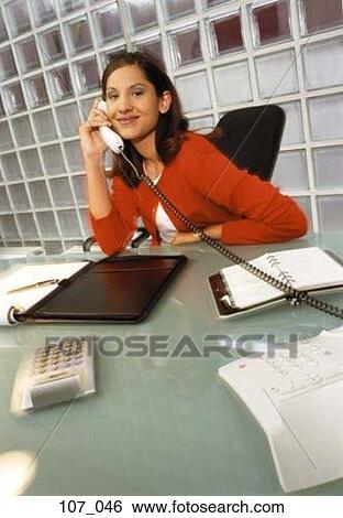 Stock Photograph - Woman in office. Fotosearch