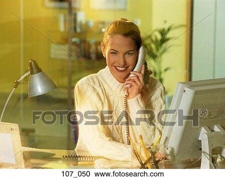 Stock Image - Woman on phone. Fotosearch