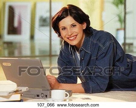 Stock Photograph - Woman with computer. Fotosearch