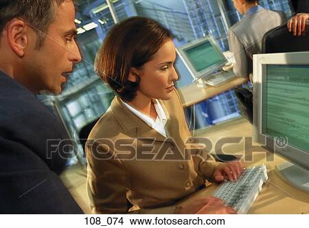Business people at computer View Large Photo Image Picture - Business people at computer. Fotosearch