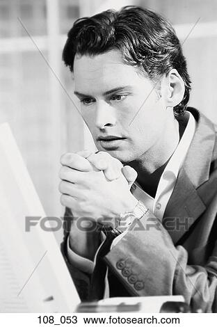 Businessman at computer View Large Photo Image Stock Image - Businessman at computer. Fotosearch