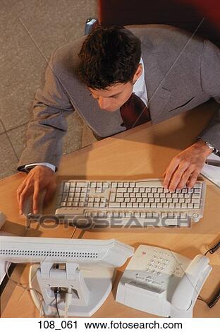 Businessman at comuter View Large Photo Image Stock Image - Businessman at comuter. Fotosearch