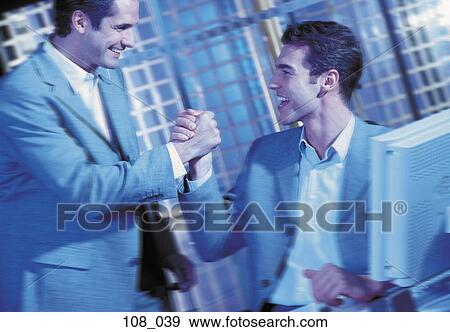 Stock Photo - Businessmen at computer. Fotosearch