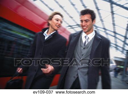 Stock Photo - Business couple on platform. Fotosearch