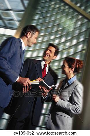Stock Image - Business people talking. Fotosearch