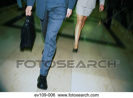 Stock Photograph - Business people walking. Fotosearch
