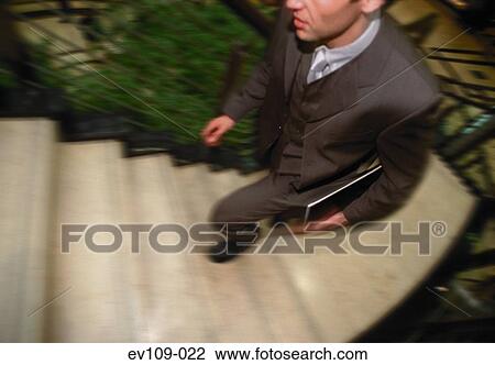 Businessman on stairs View Large Photo Image Stock Image - Businessman on stairs. Fotosearch