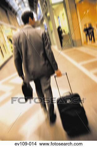 Picture - Businessman on the move. Fotosearch