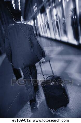 Businessman on the move View Large Photo Image Stock Image - Businessman on the move. Fotosearch