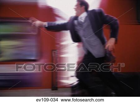 Man running after train View Large Photo Image Picture - Man running after train. Fotosearch