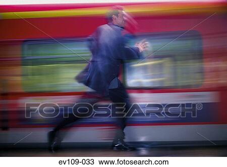 Man running after train View Large Photo Image Stock Image - Man running after train. Fotosearch