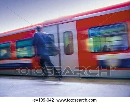 Man running after train View Large Photo Image Stock Image - Man running after train. Fotosearch