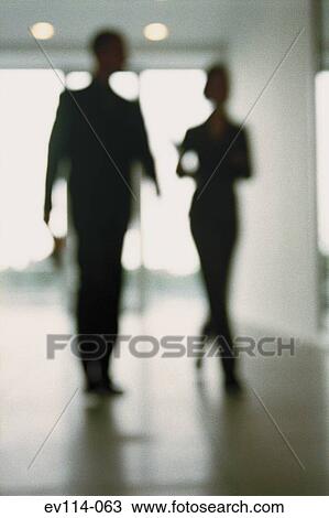 Business people in corridor View Large Photo Image Stock Image - Business people in corridor. Fotosearch