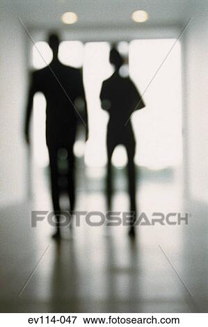 Stock Photo - Business people in corridor. Fotosearch