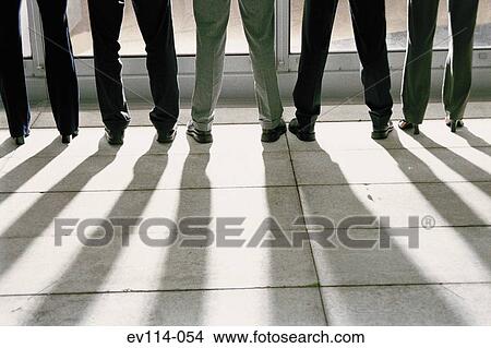 Business people standing View Large Photo Image Picture - Business people standing. Fotosearch