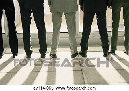 Stock Photography - Business people standing. Fotosearch