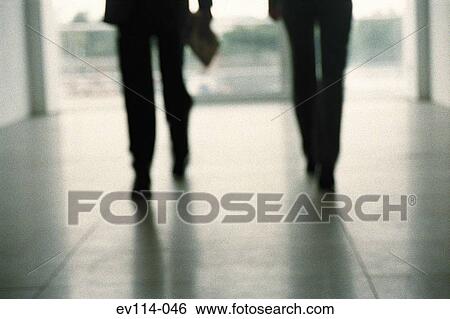 Business people walking View Large Photo Image Stock Photograph - Business people walking. Fotosearch
