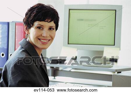 Business woman at computer View Large Photo Image Stock Image - Business woman at computer. Fotosearch