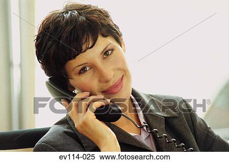 Business woman on phone View Large Photo Image Stock Photography - Business woman on phone. Fotosearch