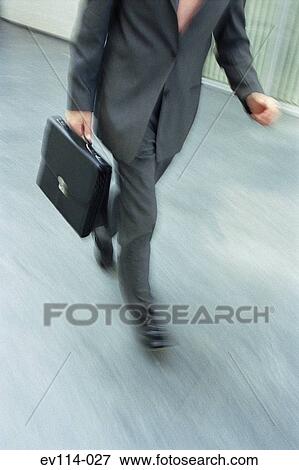 Businessman walking View Large Photo Image Stock Photo - Businessman walking. Fotosearch