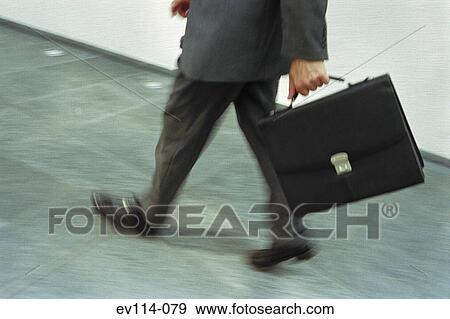 Businessman walking View Large Photo Image Stock Photo - Businessman walking. Fotosearch