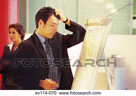 Man with flipchart View Large Photo Image Stock Image - Man with flipchart. Fotosearch