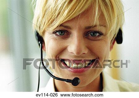Stock Photograph - Woman with headset. Fotosearch