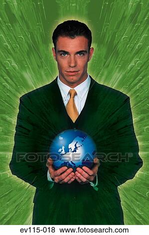 Man holding globe View Large Photo Image Stock Photo - Man holding globe. Fotosearch