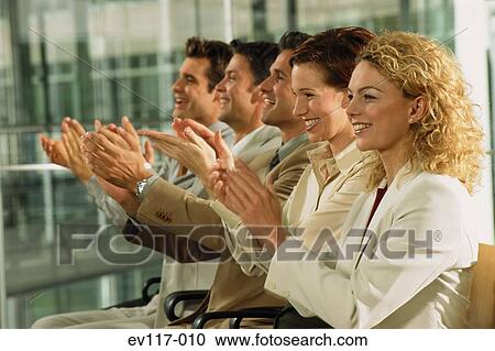 Stock Image - People at presentation. Fotosearch