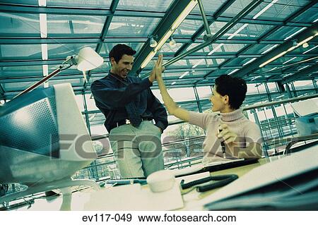Rejoicing business team View Large Photo Image Stock Photo - Rejoicing business team. Fotosearch