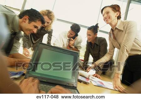 Stock Photo - Team at work. Fotosearch
